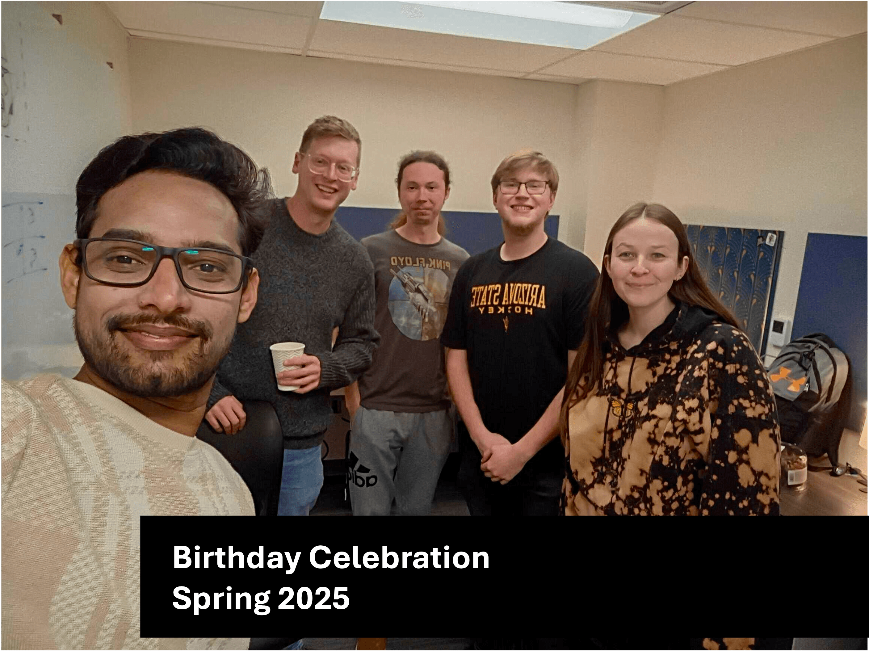 Group photo of the Earley Lab at a birthday party